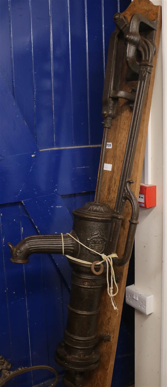 A Victorian water pump mounted on a board, Overall height 200cm